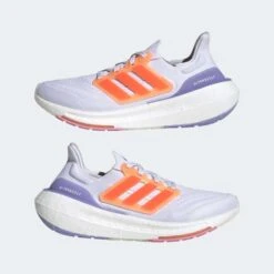 ADIDAS Women's Ultraboost Light Running Shoe - Ftwr White/Solar Red/Beam Pink - Regular (B) -Love Running 01bf57a00c1544999684af9c01358231 9366
