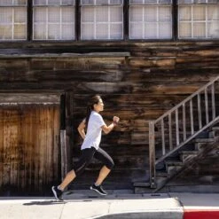 Topo Athletic Women's Ultrafly 4 Running Shoe - Black/White- Regular (B) -Love Running W056.Black White 10